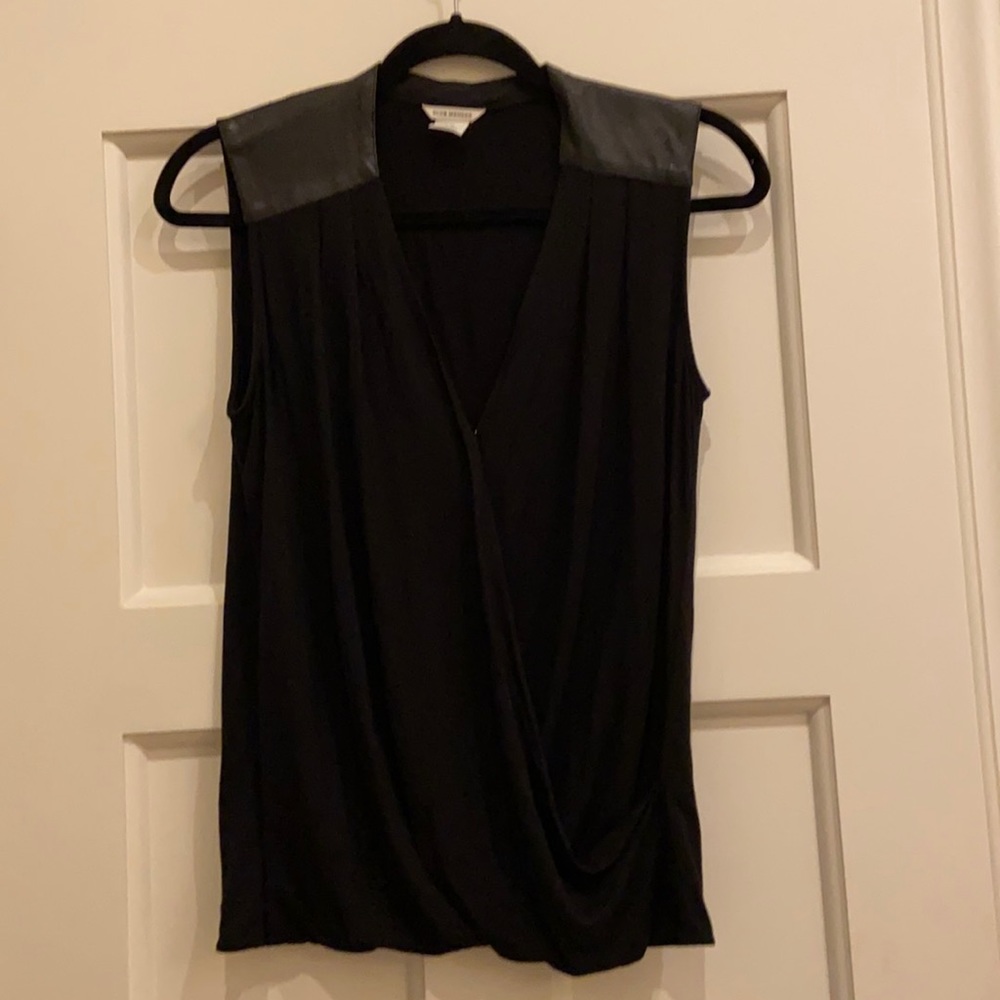 Black sleeveless Club Monaco top.